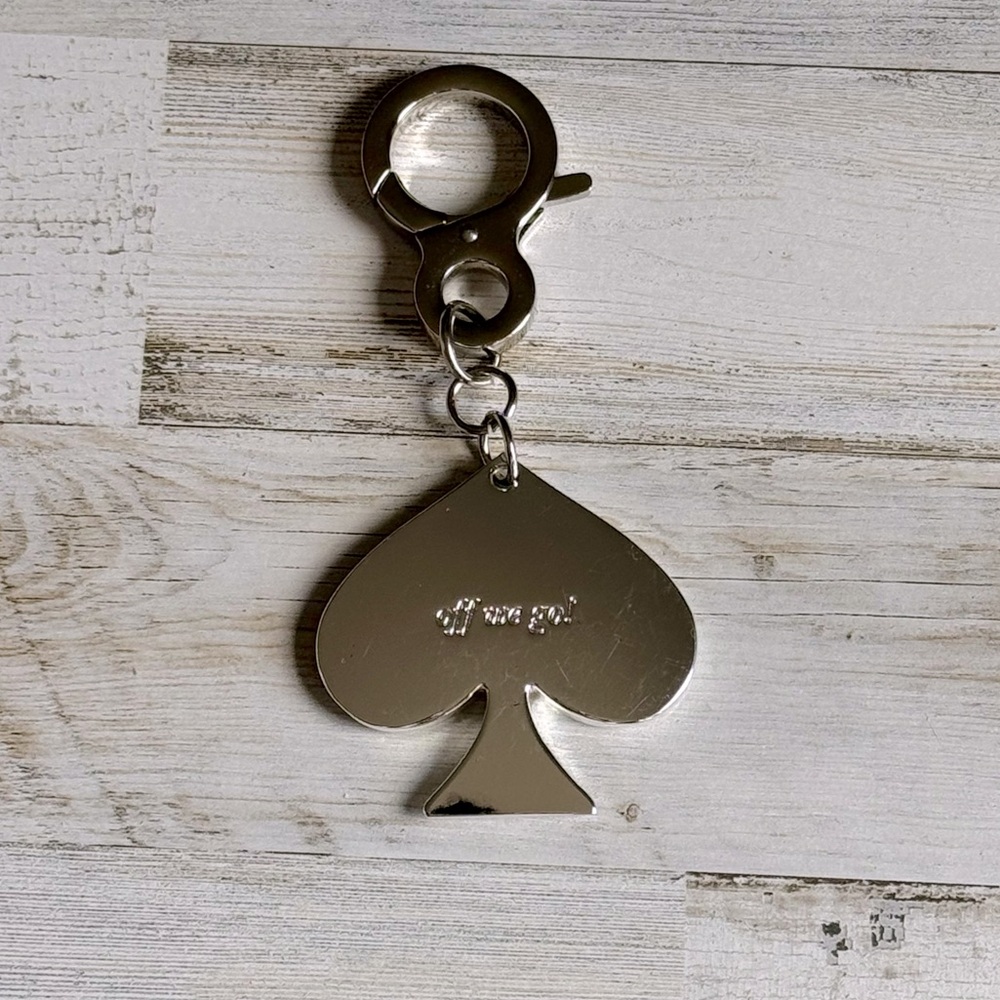 Bundle for free with any purchase - NWT Off We Go keychain